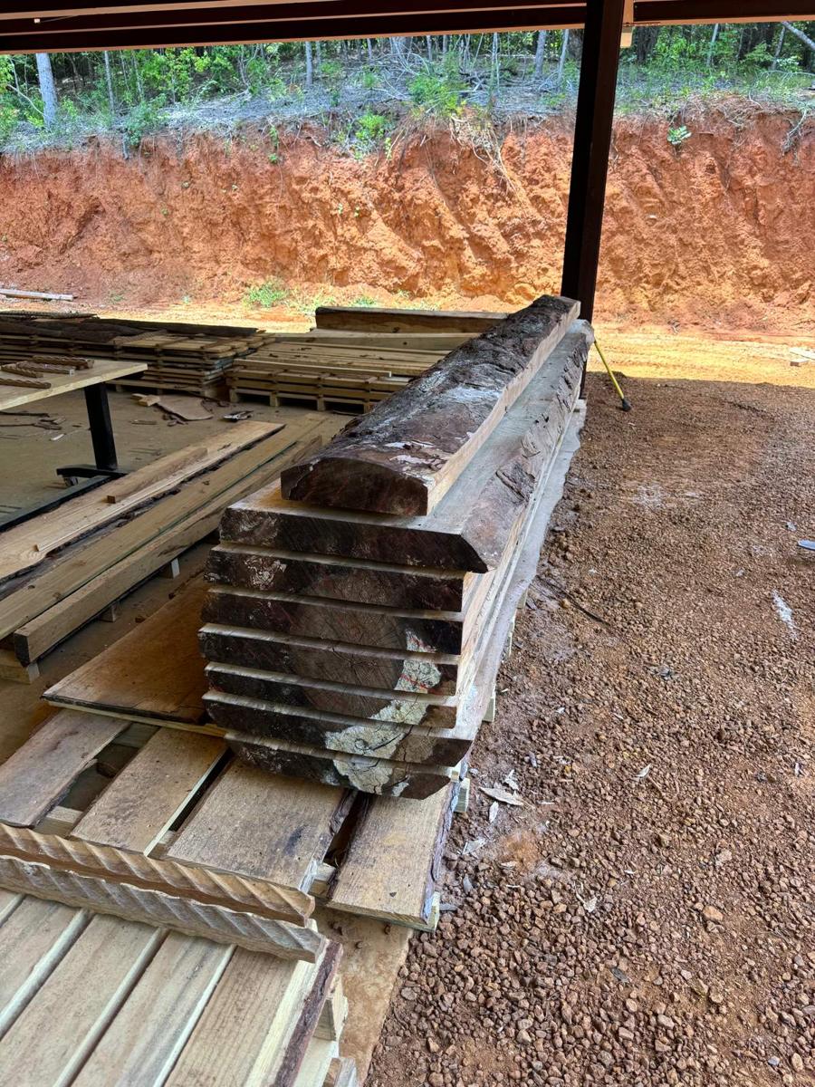 The stack on a pallet under the shed
